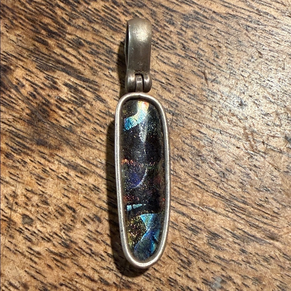 Iridescent Pendant with Sterling Silver Frame This is a dichroic glass pendant